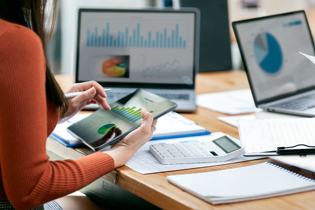 An accountant taking a look at the data gathered on a digital accounting system
