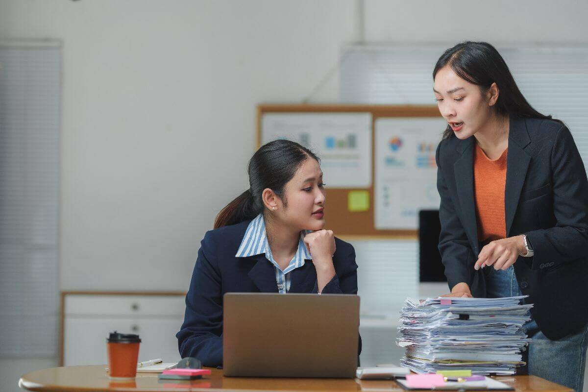 employees in office experiencing productivity and time loss