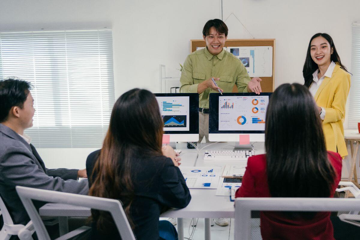 employees showing how end to end services drives roi