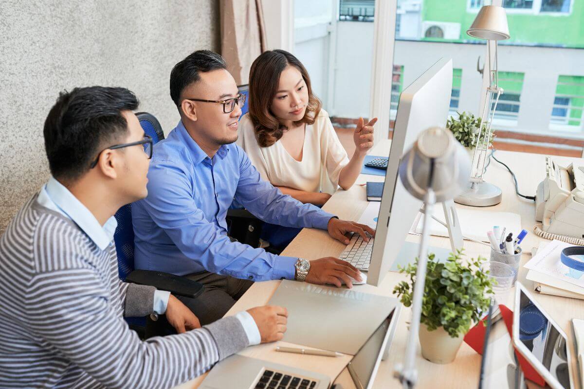 employees in office doing operational alignment 